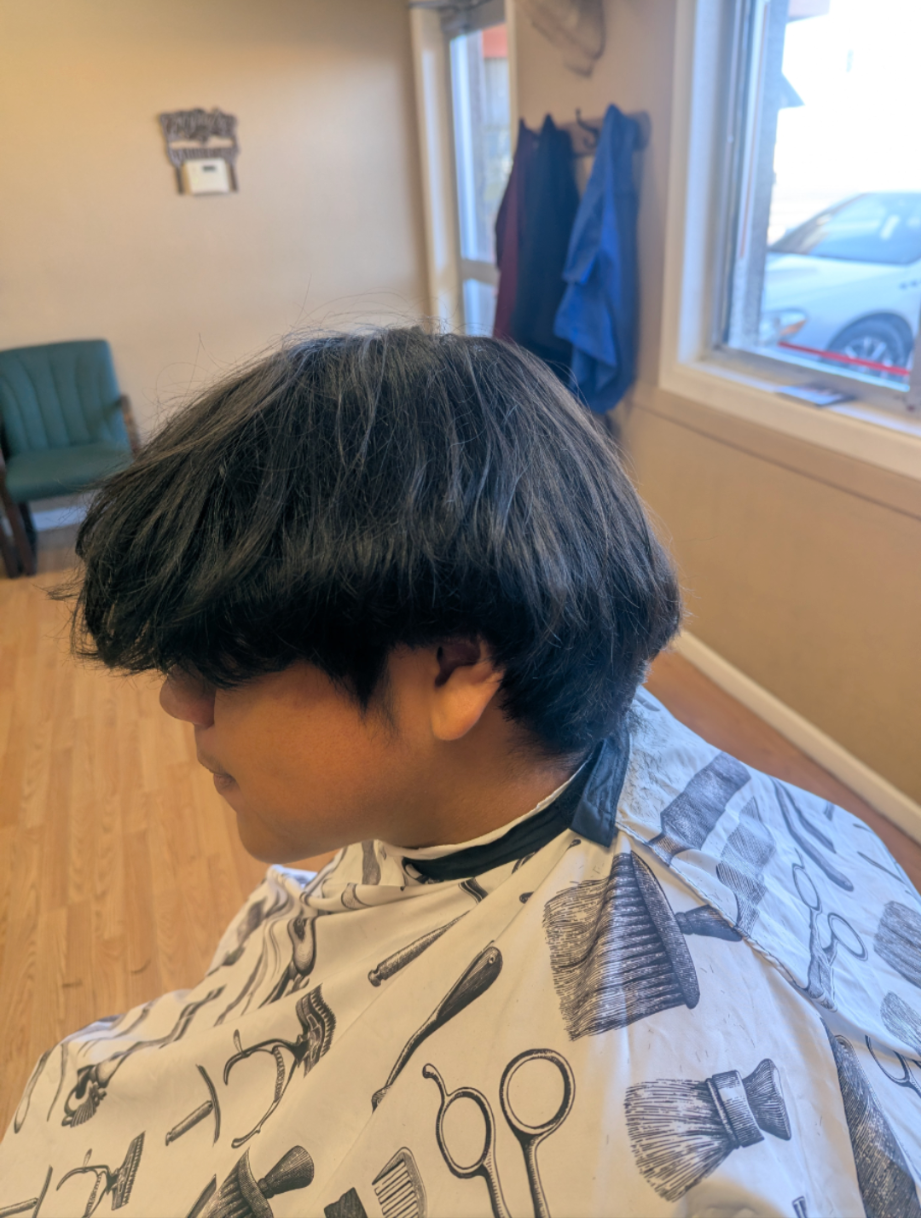 Client before the cut — grown out, shaggy hair