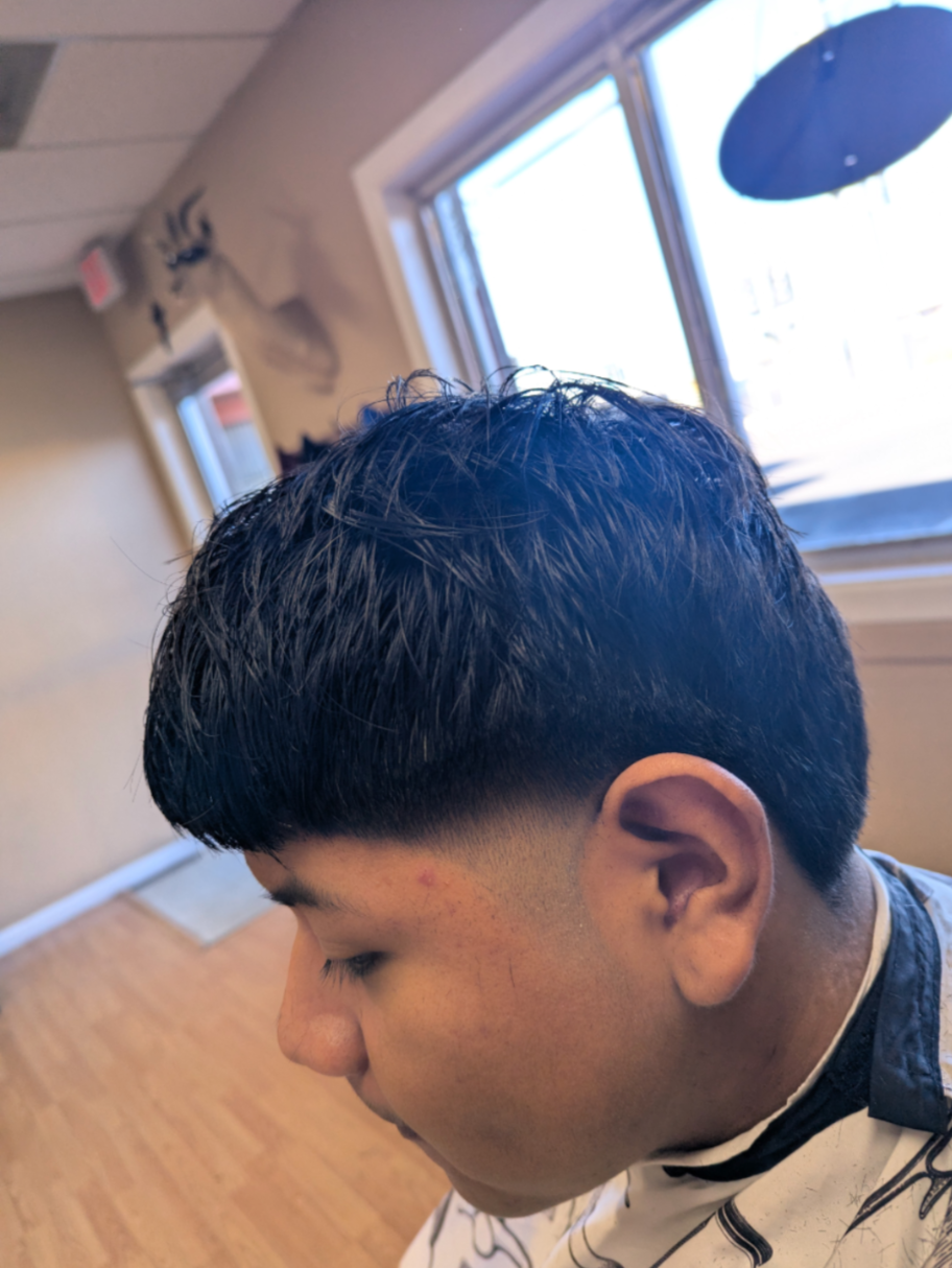 Client after — textured crop with a clean low taper by Martin